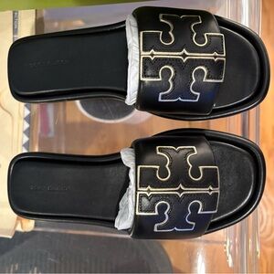 Tory Burch Black Sandals with Gold Accents
